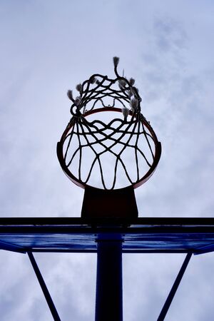 basketball hoop and blue sky, street basket in Bilbao city Spain