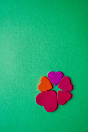 colorful hearts shape on the green background for valentine's dayの写真素材