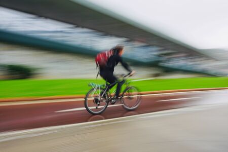 biker on the street in Bilbao city Spainの写真素材
