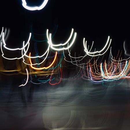 colorful lights on the street at nightの写真素材