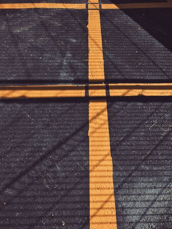 yellow lines traffic signal on the road in Bilbao city Spain