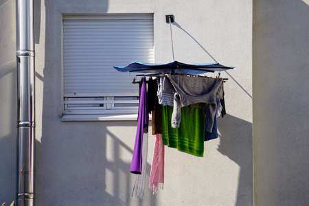 old window on the white facade of the house, architecture in Bilbao city Spain