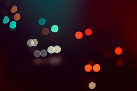 multi colored lights on the street in the city at night, bokeh lights