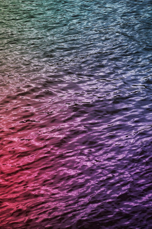 sunlight reflected on the water, multi colored backgroundの写真素材
