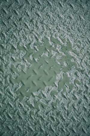 raindrops on the metallic floor, abstract backgroundの写真素材