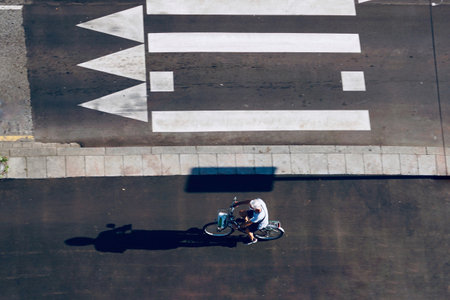 cyclist on the street, bicycle mode of transport in Bilbao city, Spainの写真素材