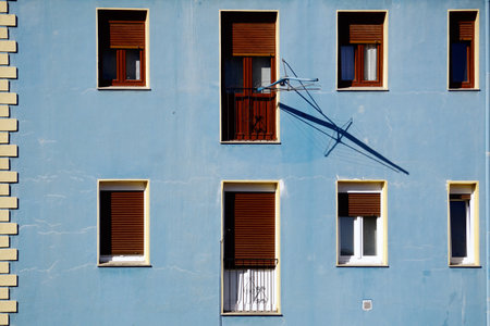 window on the blue facade of the house, architecture in Bilbao city, Spainの写真素材