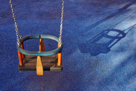 old swing on the playground, childhood moments