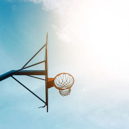 street basketball hoop and blue sky in bilbao city, Spain