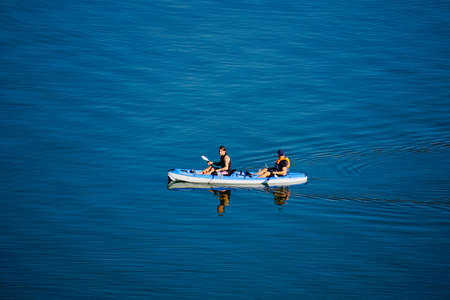 people in canoe, activities and recreation in the bilbao river, Pais Basque, Spainのeditorial素材