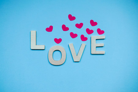 love word on the blue background for valentine's dayの写真素材