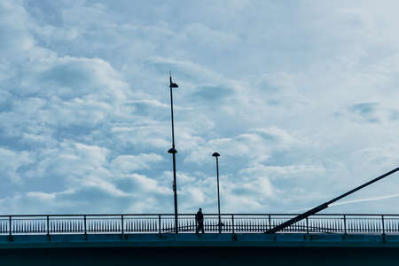 pedestrian silhouette on the bridge in Bilbao city, Spain, Travel destinationsの写真素材
