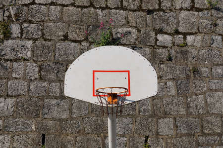 old street basketball hoop, sports equipmentの写真素材