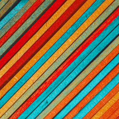 colored wooden sticks textured backgroundの写真素材