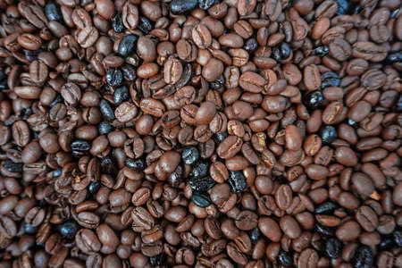 roasted beans coffee, brown backgroundの写真素材
