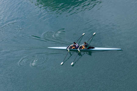 athletes training in a canoe on the Nervion River in Bilbao, basque country, spain
