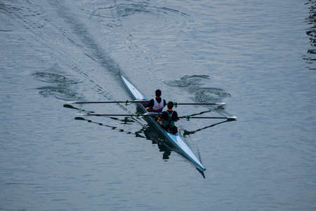 athletes training in a canoe on the Nervion River in Bilbao, basque country, spainの写真素材