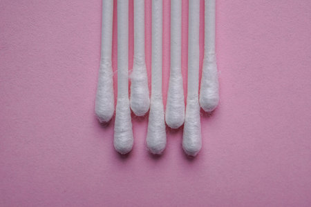 swabs on the pink background, cosmetics and hygieneの写真素材