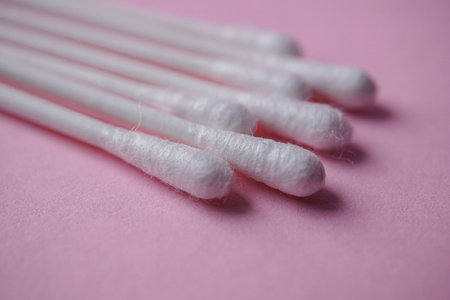 swabs on the pink background, cosmetics and hygieneの写真素材
