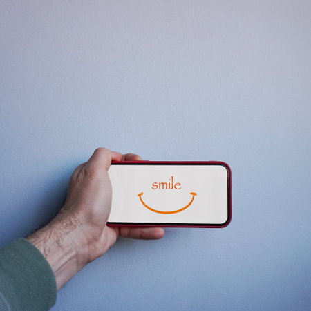smile text on the smartphone, feeling and emotionの写真素材
