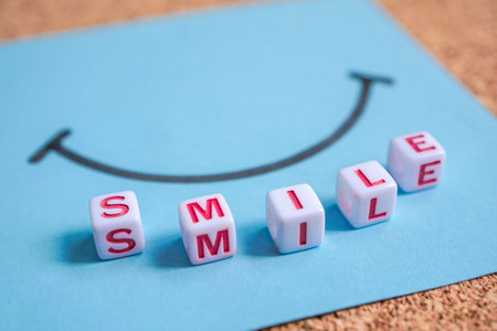 smile word with red cube letters, feelings and emotionsの写真素材