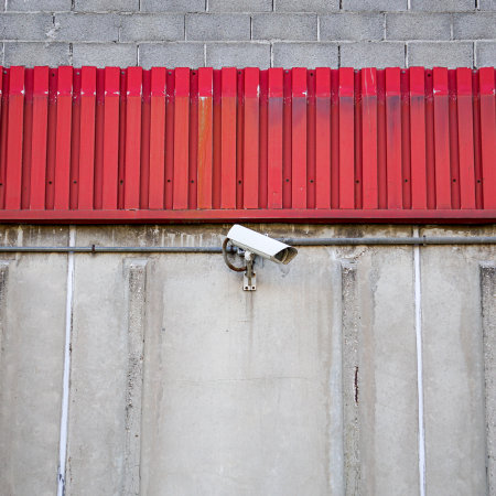 security camera on the building wallの写真素材