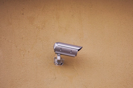 security camera on the building wallの写真素材