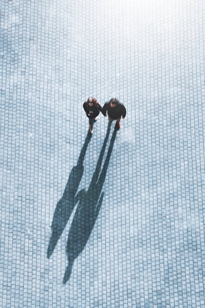 lovers walking around the street in Bilbao city, Basque country, Spainの写真素材