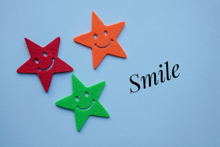 smile emotion on the blue backgroundの写真素材