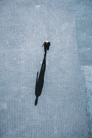 pedestrian walking around on the streetの写真素材