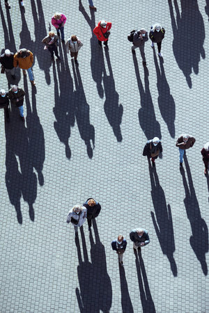large group of people walking around the city, Bilbao city, basque country, spainの写真素材