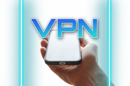 hand holding a smart phone with vpn iconの写真素材