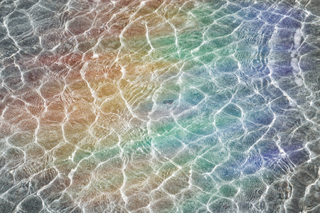 rainbow reflected in the water, abstract backgroundの写真素材