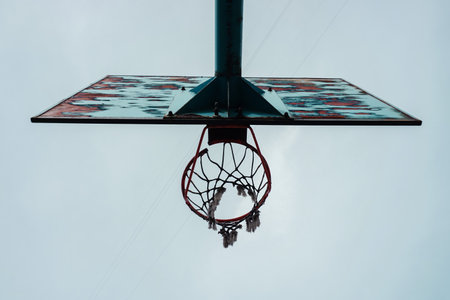 Basketball hoop and net on blue sky background. Close-up.の写真素材