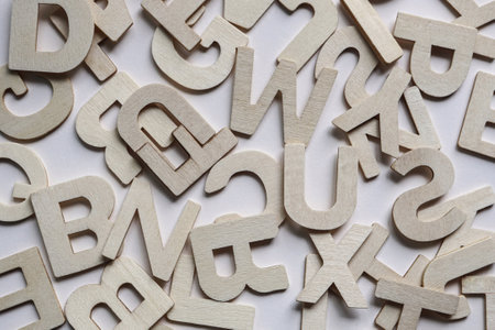Wooden alphabets as a background, closeup of photoの写真素材