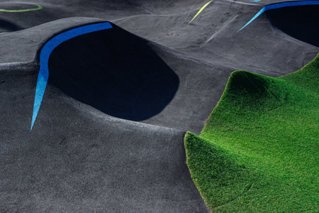 golf course with sand and green grass, closeup of photoの写真素材