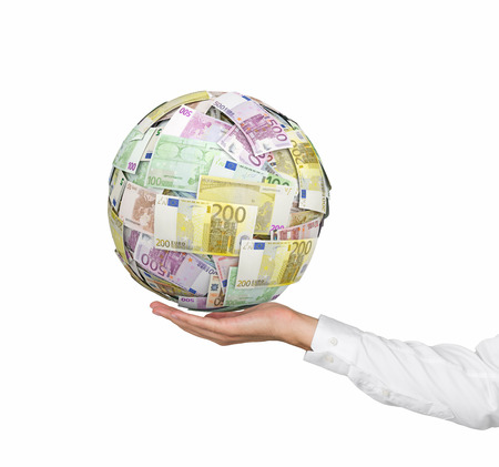 hand holding euro money ball on white backgroundの写真素材