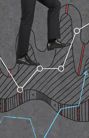 foot walking on chart isolation on grayの写真素材