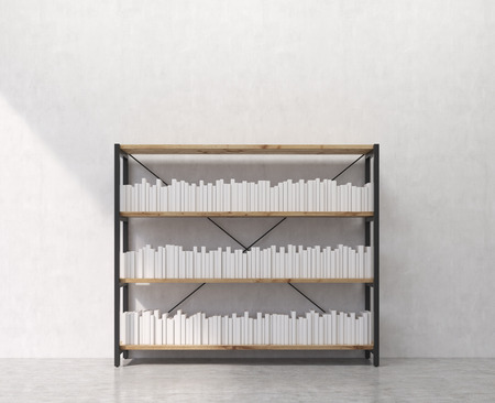 white books on shelf in libraryの写真素材