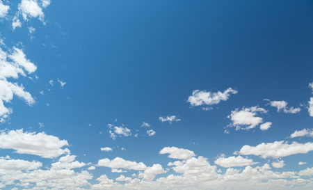 blue sky background with cloudsの写真素材