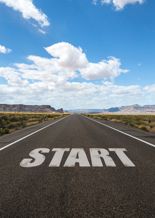 road with start text and blue skyの写真素材