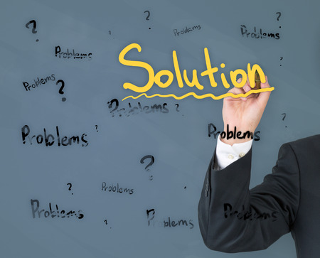 young businessman drawing solution concept, close upの写真素材
