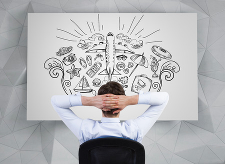 businessman looking on drawing the concept of travelの写真素材