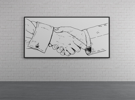 drawing handshake on a desk in roomの写真素材