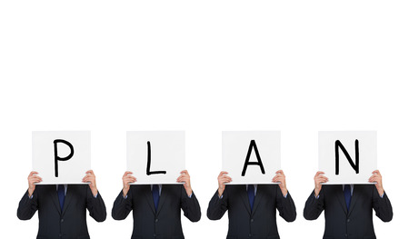 four businessman holding poster with drawing plan textの写真素材