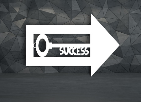 arrow with key hanging on wallの写真素材