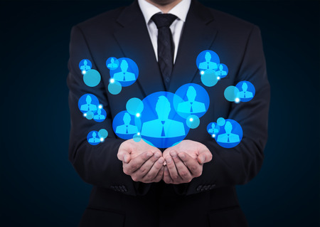 businessman employer holding a symbol of employerの写真素材