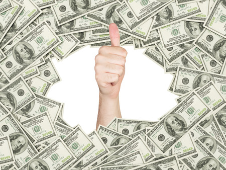 Thumb up inside the frame made of US Dollars Bills. 100 dollar nominal bills front side.の写真素材