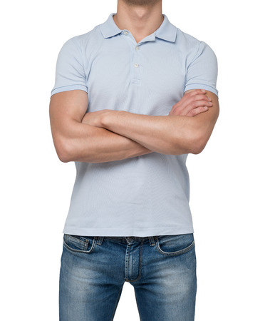 Front view of a person in a blue polo t-shirt with crossed hands. isolated.の写真素材