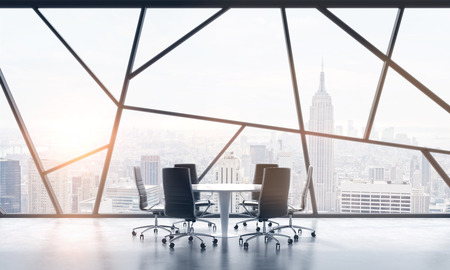 A meeting room in a bright contemporary panoramic office space with New York city view. The concept of highly professional financial or legal services. 3D rendering. Toned image.の写真素材